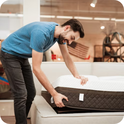 Man check warranty information of mattress