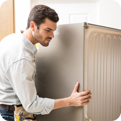 men moving kitchen appliances