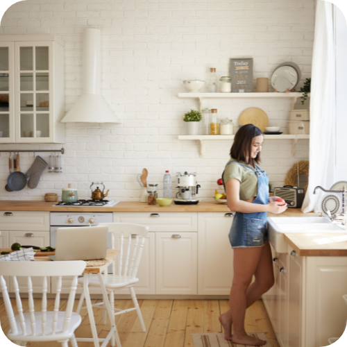 Woman doing work in kitchen