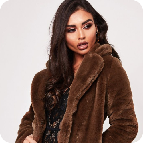 woman wearing faux fur coat