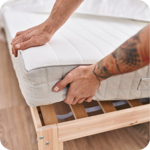 Man checking mattress
