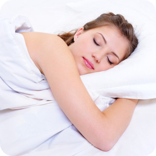 woman in sleeping position and her head on pillow