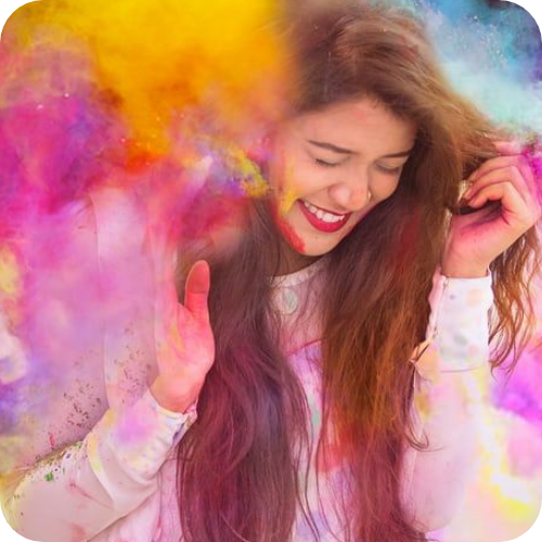 woman playing with Holi colors